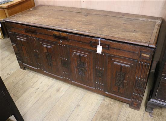 A 17th century and later inlaid oak coffer W.149cm